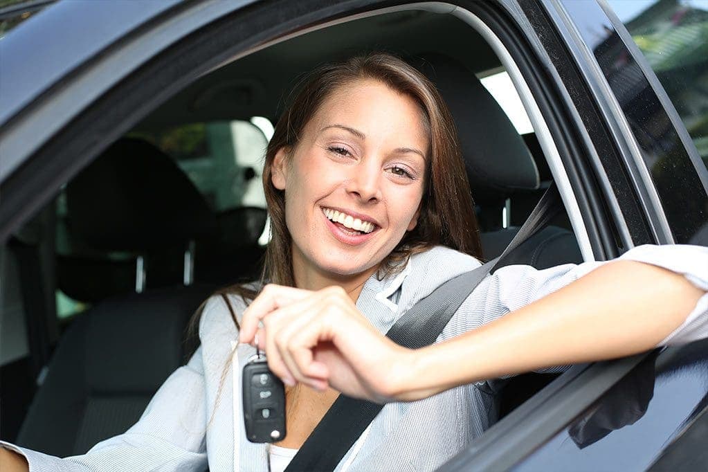 cheerful-woman-in--car
