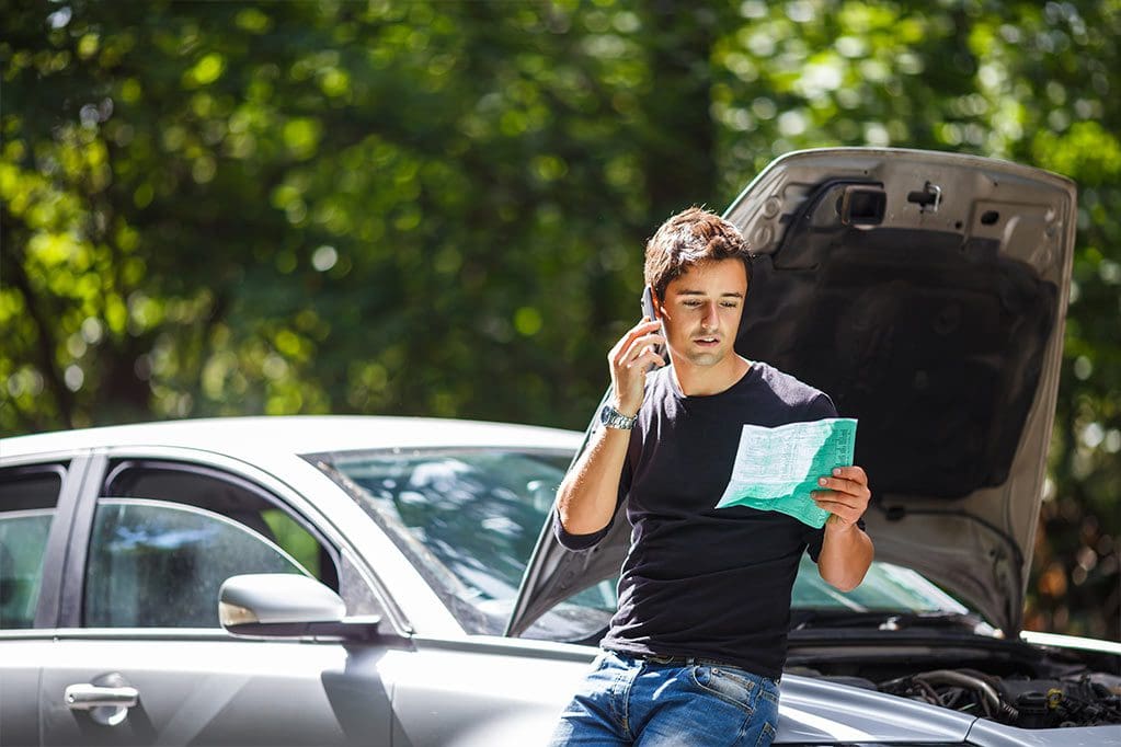 man-reading-insurance
